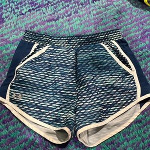 Blue and white under armour running shorts